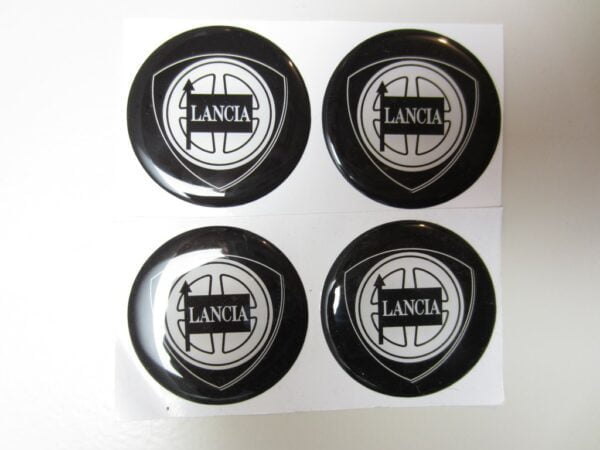 Set di decalcomanie per mozzi nere con logo Lancia Delta Integrale (set 4 pezzi) -REPRODUZIONE-