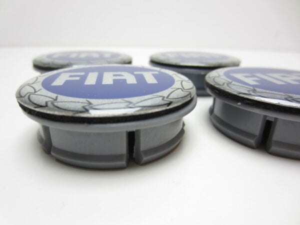 Coprimozzo Fiat Punto II Seicento logo blu (set 4 pz.) -IMITAZIONE- - immagine 4